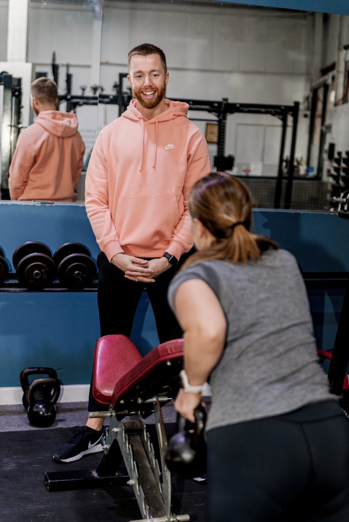 Ollie coaching a client in his private training facility
