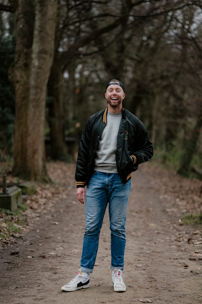 Ollie King walking through woodland